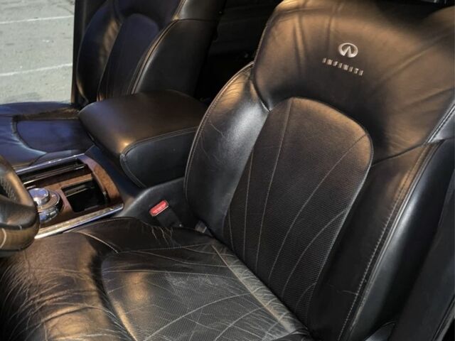 Чорний Інфініті QX56, об'ємом двигуна 5.6 л та пробігом 267 тис. км за 15000 $, фото 11 на Automoto.ua