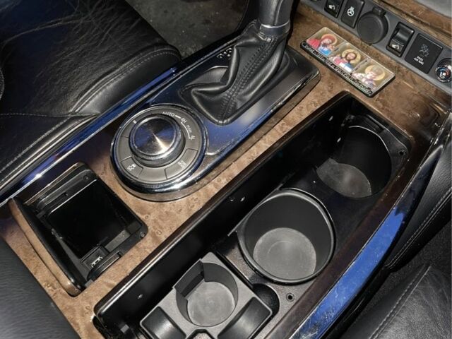 Чорний Інфініті QX56, об'ємом двигуна 5.6 л та пробігом 267 тис. км за 15000 $, фото 10 на Automoto.ua