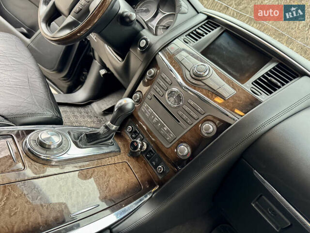 Черный Инфинити QX56, объемом двигателя 5.6 л и пробегом 220 тыс. км за 21500 $, фото 43 на Automoto.ua