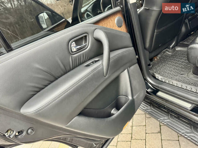 Черный Инфинити QX56, объемом двигателя 5.6 л и пробегом 220 тыс. км за 21500 $, фото 63 на Automoto.ua