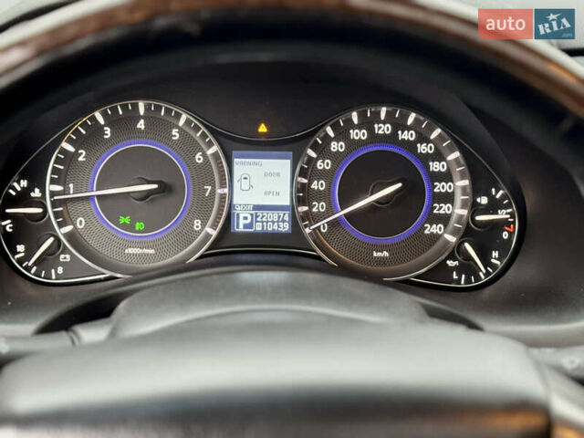 Черный Инфинити QX56, объемом двигателя 5.6 л и пробегом 220 тыс. км за 21500 $, фото 97 на Automoto.ua