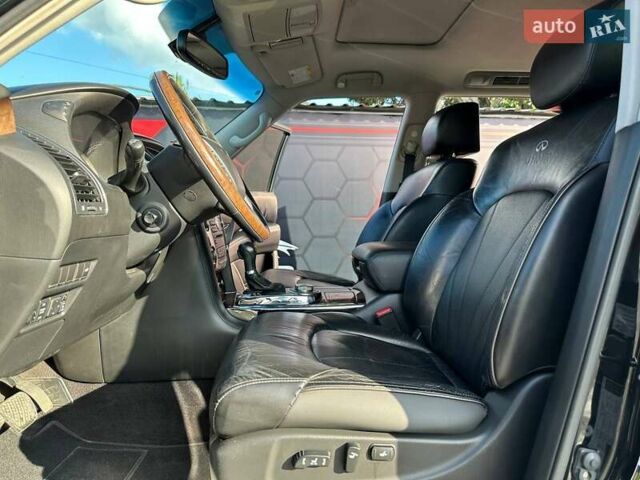 Черный Инфинити QX56, объемом двигателя 5.55 л и пробегом 203 тыс. км за 14600 $, фото 13 на Automoto.ua