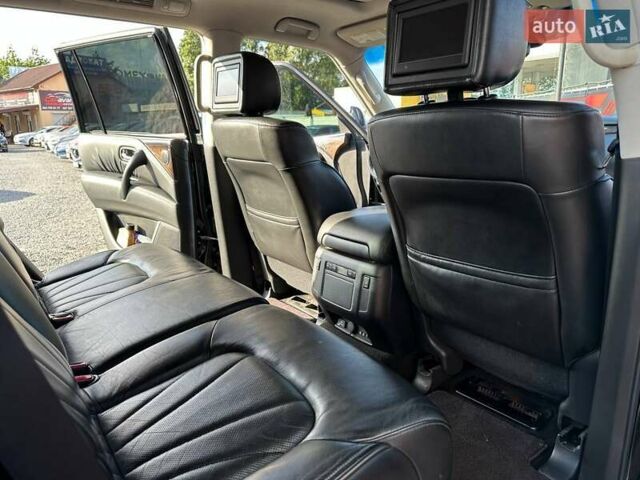 Черный Инфинити QX56, объемом двигателя 5.55 л и пробегом 203 тыс. км за 14600 $, фото 25 на Automoto.ua