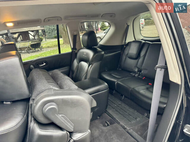 Черный Инфинити QX56, объемом двигателя 5.6 л и пробегом 220 тыс. км за 21500 $, фото 66 на Automoto.ua