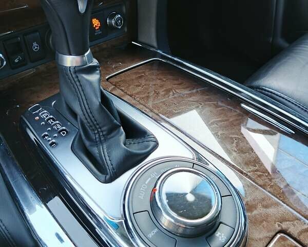 Черный Инфинити QX56, объемом двигателя 5.55 л и пробегом 141 тыс. км за 19100 $, фото 9 на Automoto.ua