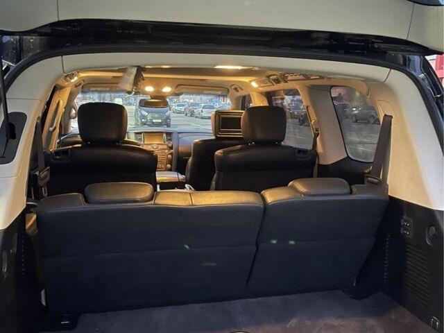 Чорний Інфініті QX56, об'ємом двигуна 5.6 л та пробігом 267 тис. км за 15000 $, фото 5 на Automoto.ua