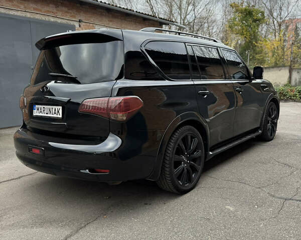 Черный Инфинити QX56, объемом двигателя 5.55 л и пробегом 322 тыс. км за 20000 $, фото 3 на Automoto.ua