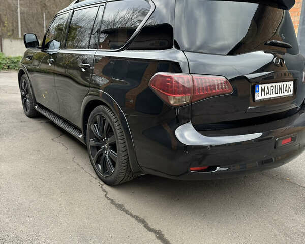 Черный Инфинити QX56, объемом двигателя 5.55 л и пробегом 322 тыс. км за 20000 $, фото 1 на Automoto.ua