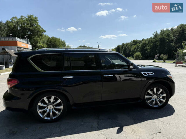 Черный Инфинити QX56, объемом двигателя 5.55 л и пробегом 255 тыс. км за 19000 $, фото 2 на Automoto.ua