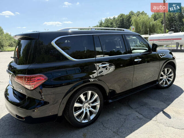 Черный Инфинити QX56, объемом двигателя 5.55 л и пробегом 255 тыс. км за 19000 $, фото 3 на Automoto.ua