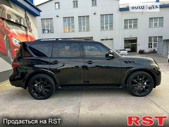 Чорний Інфініті QX56, об'ємом двигуна 5.6 л та пробігом 316 тис. км за 18500 $, фото 4 на Automoto.ua