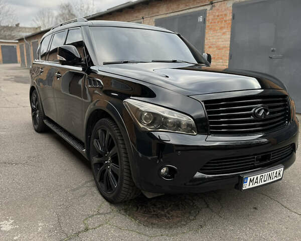 Черный Инфинити QX56, объемом двигателя 5.55 л и пробегом 322 тыс. км за 20000 $, фото 4 на Automoto.ua