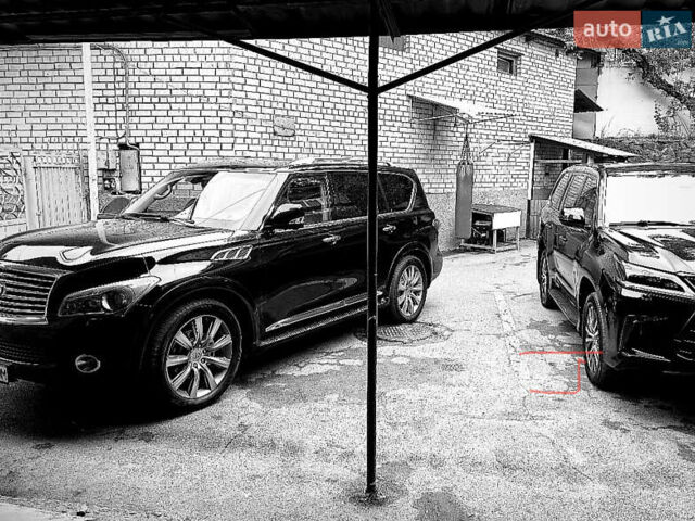 Черный Инфинити QX56, объемом двигателя 5.6 л и пробегом 230 тыс. км за 15000 $, фото 48 на Automoto.ua
