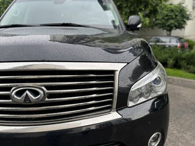 Черный Инфинити QX56, объемом двигателя 5.6 л и пробегом 305 тыс. км за 17800 $, фото 4 на Automoto.ua