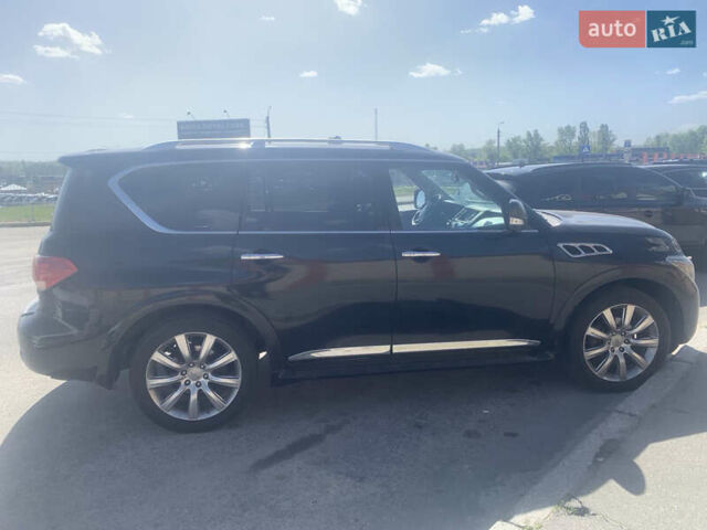 Черный Инфинити QX56, объемом двигателя 5.55 л и пробегом 305 тыс. км за 17800 $, фото 2 на Automoto.ua