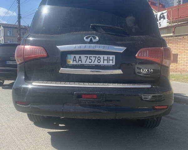 Черный Инфинити QX56, объемом двигателя 5.55 л и пробегом 305 тыс. км за 17800 $, фото 1 на Automoto.ua