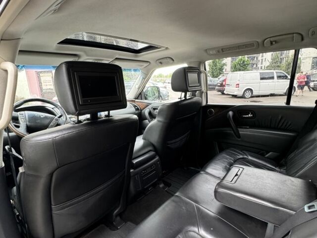 Черный Инфинити QX56, объемом двигателя 5.6 л и пробегом 305 тыс. км за 17800 $, фото 6 на Automoto.ua