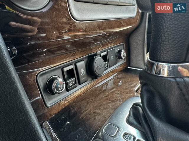 Черный Инфинити QX56, объемом двигателя 5.6 л и пробегом 230 тыс. км за 15000 $, фото 32 на Automoto.ua