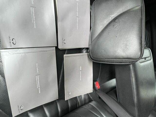 Черный Инфинити QX56, объемом двигателя 5.6 л и пробегом 305 тыс. км за 17800 $, фото 7 на Automoto.ua