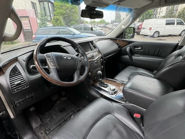 Черный Инфинити QX56, объемом двигателя 5.6 л и пробегом 305 тыс. км за 17800 $, фото 5 на Automoto.ua