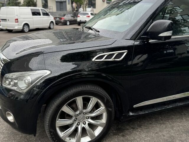 Черный Инфинити QX56, объемом двигателя 5.6 л и пробегом 305 тыс. км за 17800 $, фото 3 на Automoto.ua