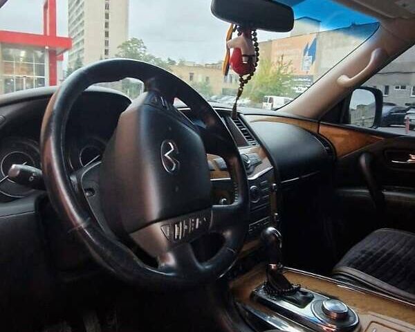 Чорний Інфініті QX56, об'ємом двигуна 5.55 л та пробігом 137 тис. км за 23000 $, фото 9 на Automoto.ua