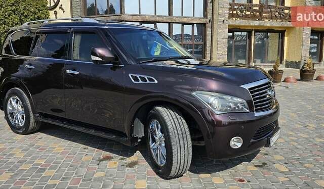 Коричневий Інфініті QX56, об'ємом двигуна 5.55 л та пробігом 265 тис. км за 25000 $, фото 10 на Automoto.ua
