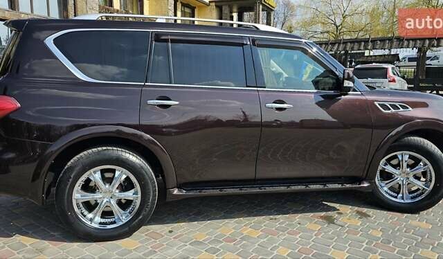 Коричневый Инфинити QX56, объемом двигателя 5.55 л и пробегом 265 тыс. км за 25000 $, фото 8 на Automoto.ua