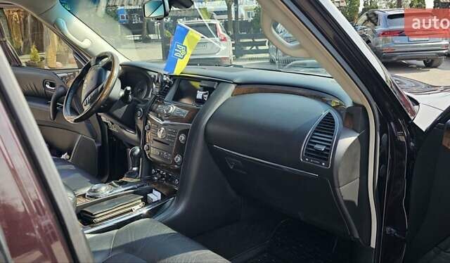 Коричневый Инфинити QX56, объемом двигателя 5.55 л и пробегом 265 тыс. км за 25000 $, фото 26 на Automoto.ua
