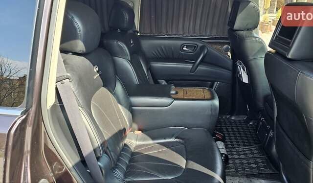 Коричневий Інфініті QX56, об'ємом двигуна 5.55 л та пробігом 265 тис. км за 25000 $, фото 24 на Automoto.ua