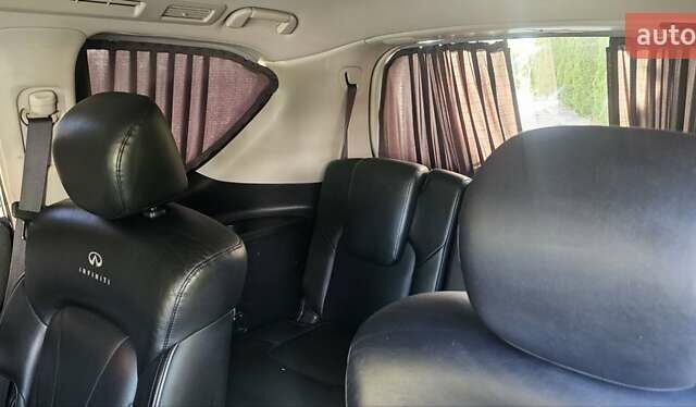 Коричневый Инфинити QX56, объемом двигателя 5.55 л и пробегом 265 тыс. км за 25000 $, фото 12 на Automoto.ua