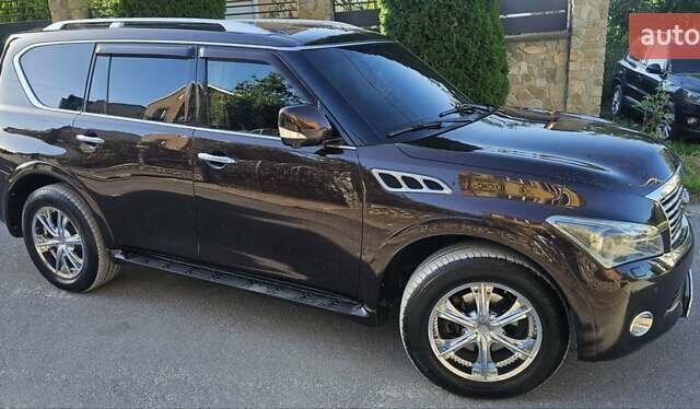 Коричневый Инфинити QX56, объемом двигателя 5.55 л и пробегом 265 тыс. км за 25000 $, фото 2 на Automoto.ua