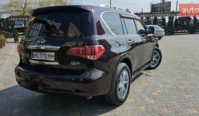 Коричневый Инфинити QX56, объемом двигателя 5.55 л и пробегом 265 тыс. км за 25000 $, фото 6 на Automoto.ua
