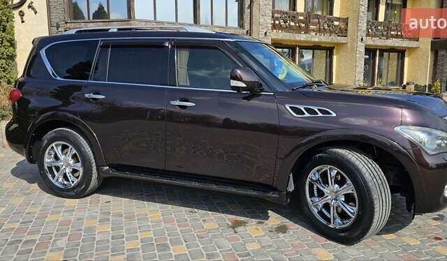Коричневый Инфинити QX56, объемом двигателя 5.55 л и пробегом 265 тыс. км за 25000 $, фото 9 на Automoto.ua
