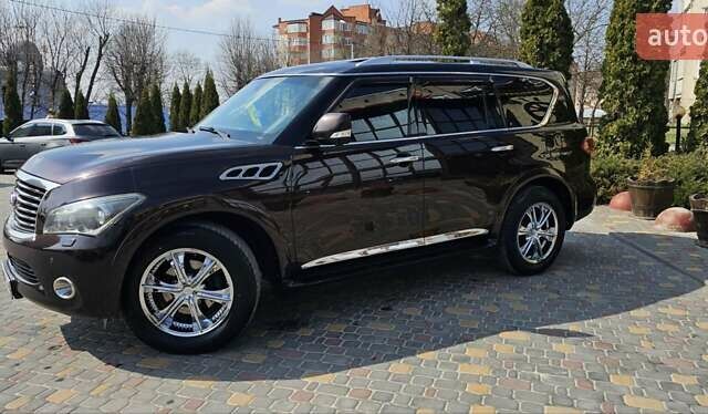 Коричневий Інфініті QX56, об'ємом двигуна 5.55 л та пробігом 265 тис. км за 25000 $, фото 1 на Automoto.ua