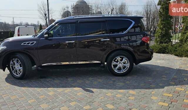 Коричневый Инфинити QX56, объемом двигателя 5.55 л и пробегом 265 тыс. км за 25000 $, фото 2 на Automoto.ua