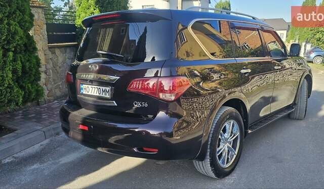 Коричневый Инфинити QX56, объемом двигателя 5.55 л и пробегом 265 тыс. км за 25000 $, фото 5 на Automoto.ua