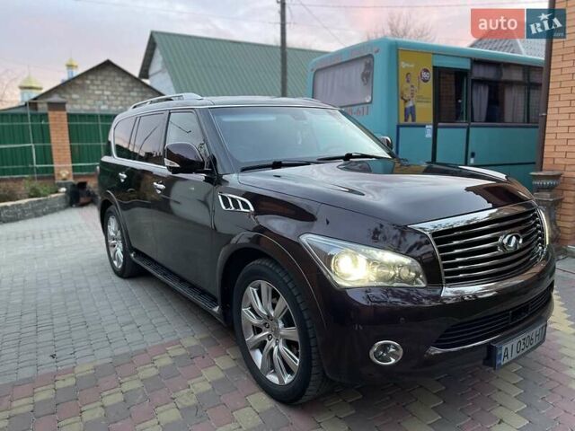 Коричневий Інфініті QX56, об'ємом двигуна 5.6 л та пробігом 122 тис. км за 23000 $, фото 4 на Automoto.ua