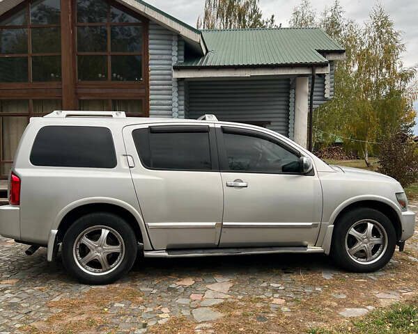 Серый Инфинити QX56, объемом двигателя 5.55 л и пробегом 184 тыс. км за 9500 $, фото 6 на Automoto.ua