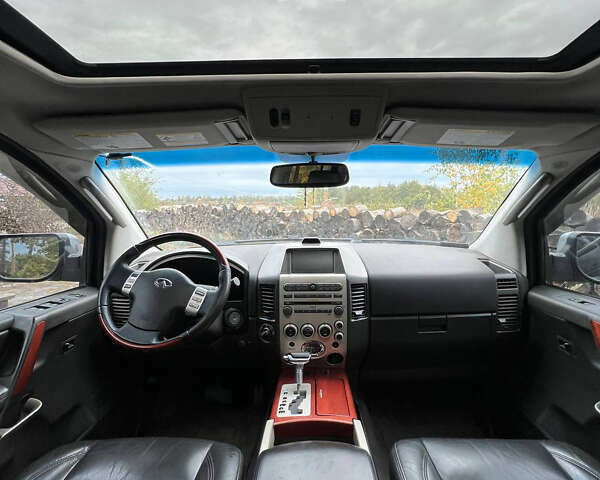 Серый Инфинити QX56, объемом двигателя 5.55 л и пробегом 184 тыс. км за 9300 $, фото 16 на Automoto.ua