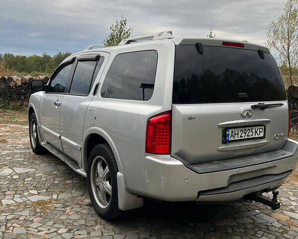 Серый Инфинити QX56, объемом двигателя 5.55 л и пробегом 184 тыс. км за 9300 $, фото 2 на Automoto.ua