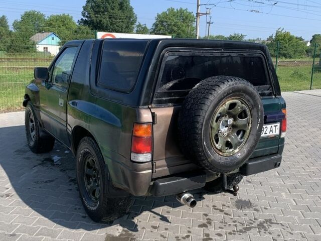 Зеленый Исузу Амиго, объемом двигателя 2 л и пробегом 250 тыс. км за 3000 $, фото 3 на Automoto.ua