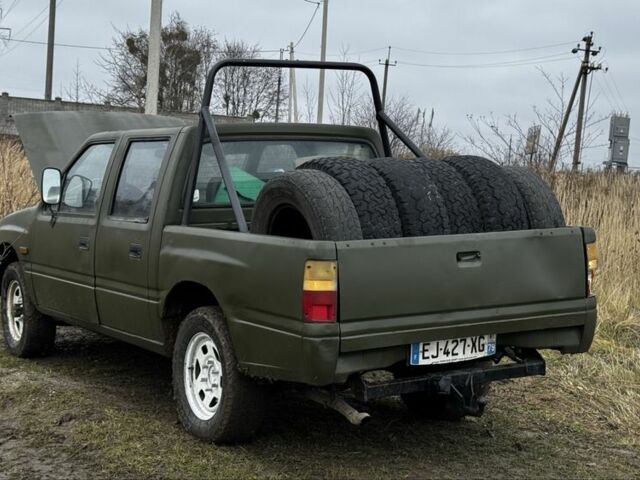 Зеленый Исузу Кампо, объемом двигателя 3.1 л и пробегом 666 тыс. км за 4000 $, фото 5 на Automoto.ua