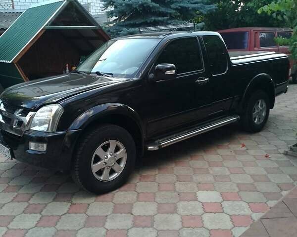 Чорний Ісузу D-Max, об'ємом двигуна 3 л та пробігом 300 тис. км за 12000 $, фото 13 на Automoto.ua