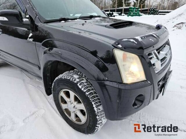 Чорний Ісузу D-Max, об'ємом двигуна 3 л та пробігом 296 тис. км за 7186 $, фото 5 на Automoto.ua