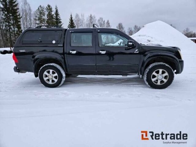 Чорний Ісузу D-Max, об'ємом двигуна 3 л та пробігом 296 тис. км за 7186 $, фото 1 на Automoto.ua
