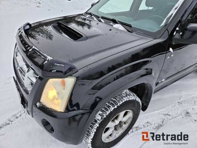 Чорний Ісузу D-Max, об'ємом двигуна 3 л та пробігом 296 тис. км за 7186 $, фото 3 на Automoto.ua