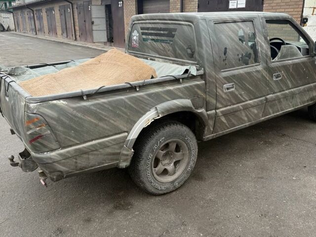 Зелений Ісузу D-Max, об'ємом двигуна 2.5 л та пробігом 288 тис. км за 2300 $, фото 5 на Automoto.ua