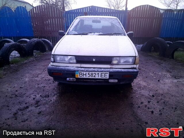 Белый Исузу Джемини, объемом двигателя 1.5 л и пробегом 102 тыс. км за 1000 $, фото 2 на Automoto.ua