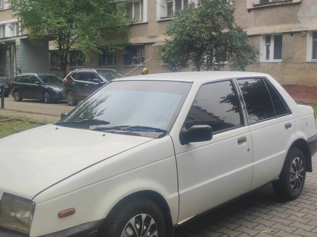 Белый Исузу Джемини, объемом двигателя 1.5 л и пробегом 200 тыс. км за 850 $, фото 1 на Automoto.ua
